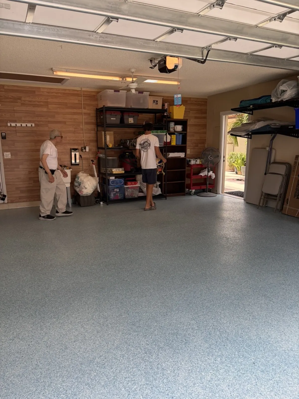 Finished Maui Blue flake epoxy garage floor, full room view